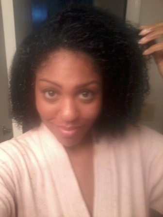 African American hair wet, kiky curly with protein treatment in hair